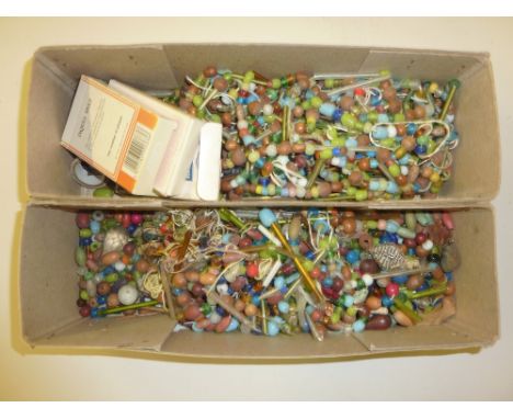 Two boxes of beads and playing cards