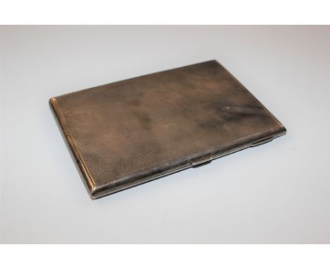 A Sterling silver engine turned cigarette case