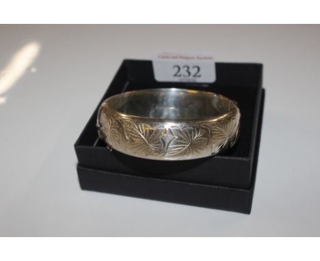 A 1970's LTS Ltd Birmingham Sterling silver hinged bangle, approx. 34gms 