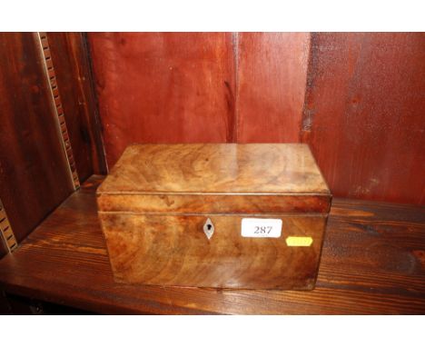 A 19th Century walnut and mother of pearl inlaid tea caddy (missing interior)