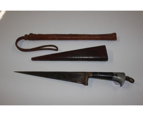 A vintage dagger; and a leather covered Kosh