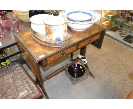 A walnut veneered sofa table 