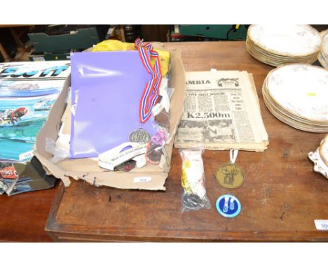 A quantity of various stamps, vintage newspapers, sporting medals etc.