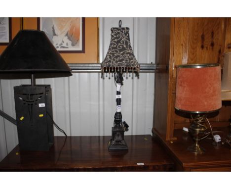 A modern decorative table lamp with beaded shade 