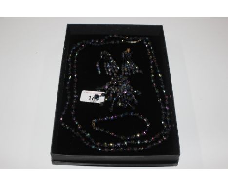 A boxed vintage long necklace, ear-rings brooch and bracelet