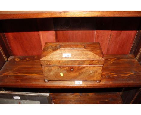 A 19th Century mahogany sarcophagus shaped tea caddy (lacking liner)