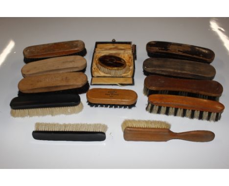 A collection of various vintage brushes 