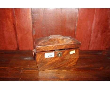 A 19th Century sarcophagus shaped tea caddy (interior AF)