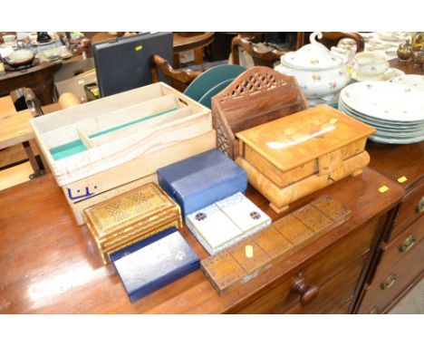 A quantity of mostly wooden ware to include stationery racks, cutlery trays, playing cards, cribbage board, musical jewellery