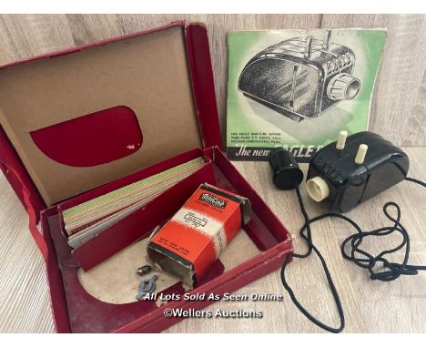 VINTAGE MARTIN LUCAS EAGLE FILMS PROJECTOR REPORTED TO BE IN WORKING ORDER WITH SLIDES 
