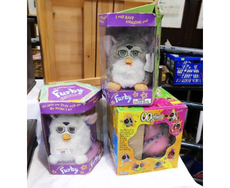 Two vintage boxed Furbies and boxed Ooglies toy