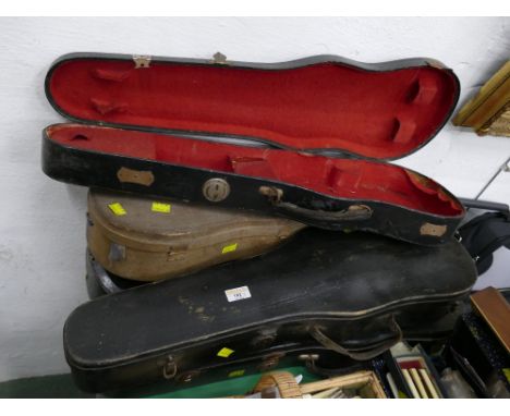 Vintage empty wooden and metal violin cases