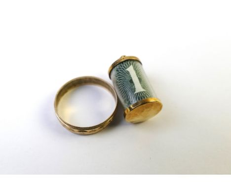 9 ct gold ring weight +/- 2 grams and 9 ct gold £1 note cylinder charm