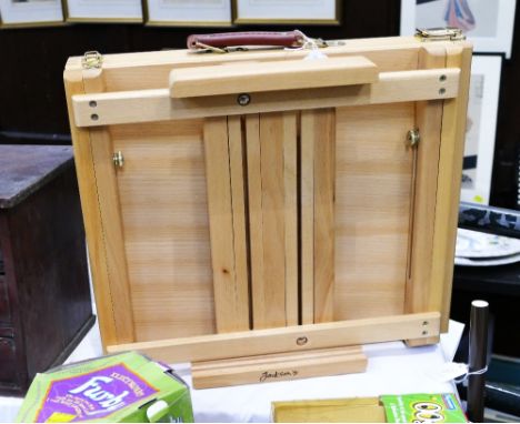 Jacksons folding portable easel and Eubank carpet sweeper