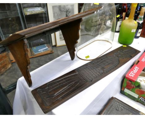 Vintage oak bracket shelf and a carved plaque featuring a cartoon figure