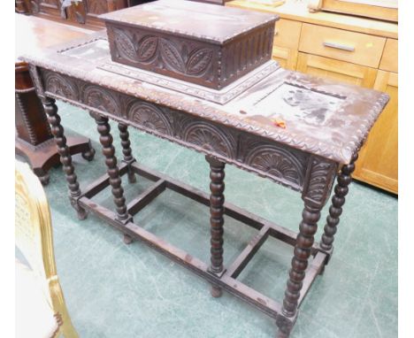 Mahogany heavily carved with bobbin turned legs hall table