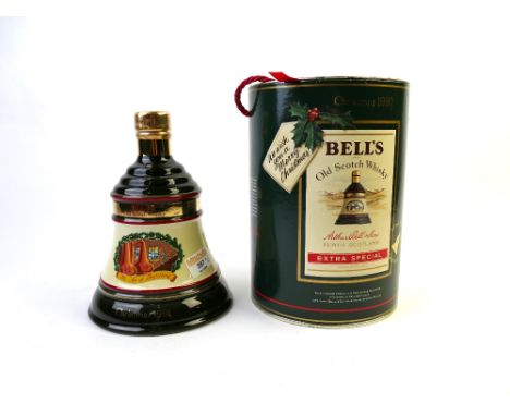 Bells Old Scotch Whisky decanter, Christmas 1990 in tin and an unboxed Bells Christmas 1991 decanter