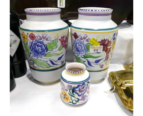 Pair of Poole pottery vases and a smaller vase
