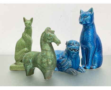 A group of ceramic animal models comprising: a Bitossi style green glazed pottery horse; a green crackle glazed model of a se