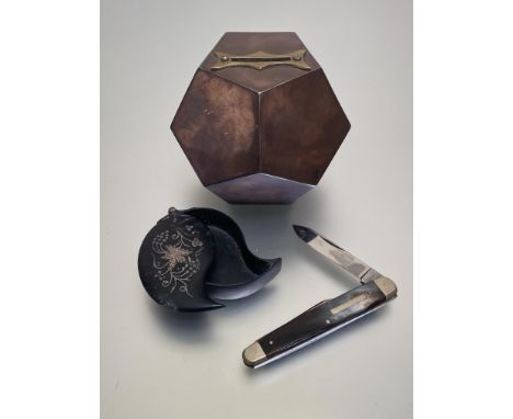 An Indian Bidri ware inlaid leaf-shaped snuff box, c. 1900; a brass-mounted hexagonal copper money box; and a Sheffield white