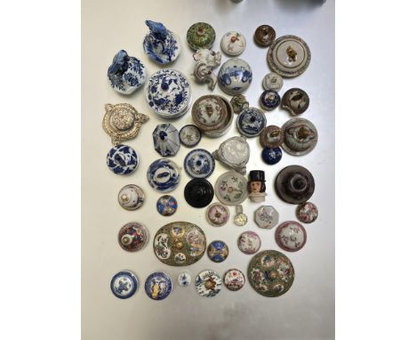 A large group of Chinese and Continental porcelain and other ceramic covers and stands (a quantity).