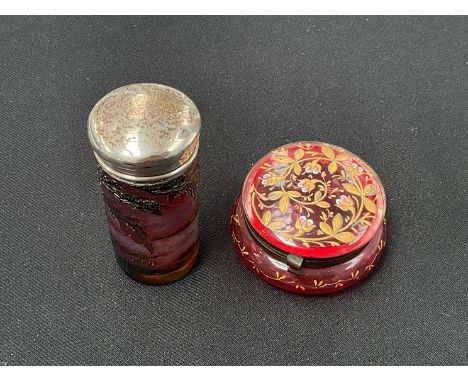 A silver topped cameo glass cylindrical container with evening landscape design, signed, and a pink glass trinket pot with gi