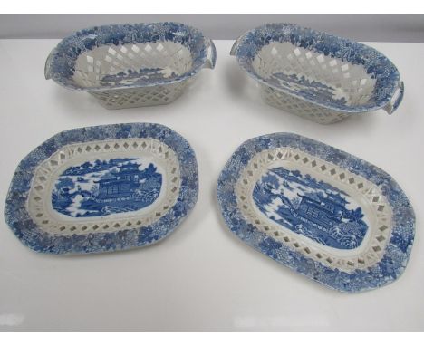 A pair of Spode Willow pattern blue and white transfer ware Chestnut baskets and stands 