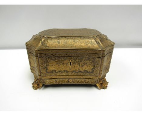 A 19th century Chinese export lacquer gilded tea caddy, the sides and lids heavily decorated with scenes, lid opens to reveal