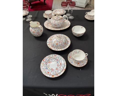 A Spode breakfast set comprising of eight cups, saucers, side plates, teapot, jug, sugar bowl, muffin dish, large server and 