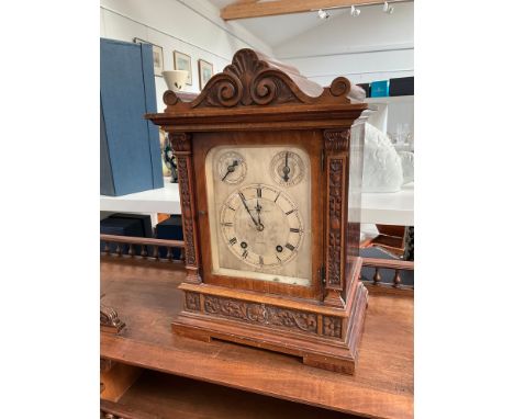 A Whytock &amp; Sons of Dundee bracket clock, silvered dial, Roman numerated with walnut carved case, back door locked, 41cm 