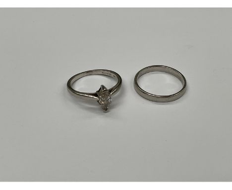 A platinum ring set with marquis cut diamond, approximately 0.40ct, size J/K, together with platinum band, together 5.5g (2) 