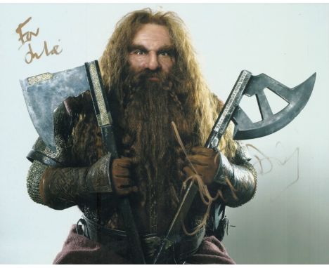 John Rhys Davies signed 10x8 inch Gimli Lord of the Rings colour photo. Dedicated. Good condition. All autographs come with a