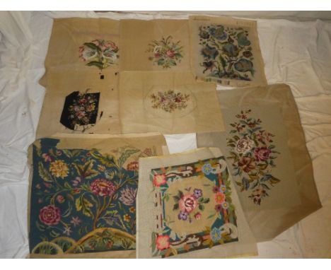 Eight various needlework tapestry panels depicting flowers and floral designs, unmounted