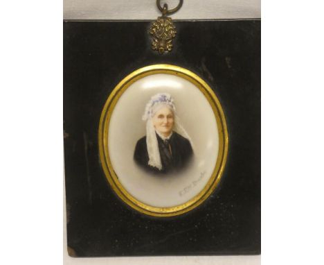 A Victorian miniature on porcelain depicting bust portrait of an elderly female, signed "F Till Dresden", 3" x 2½" in ebonise