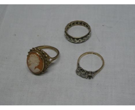 A 9ct gold dress ring set oval cameo panel, 9ct gold damaged dress ring and one other (3)