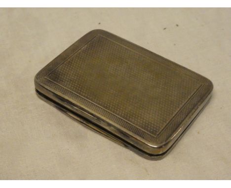 A George V silver rectangular pocket box with engine turned decoration, 3" long, London marks 1919