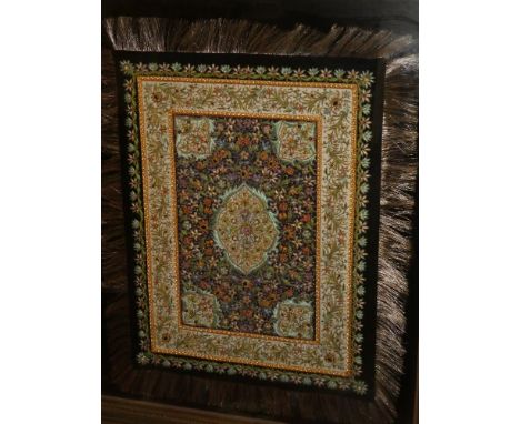 An Indian embroidered wire and silk rectangular panel mounted with various semi precious stones and jewels, 27" x 21½"
