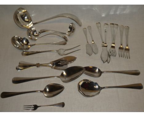 A selection of French silver table cutlery including ladle, serving spoons, table forks etc.