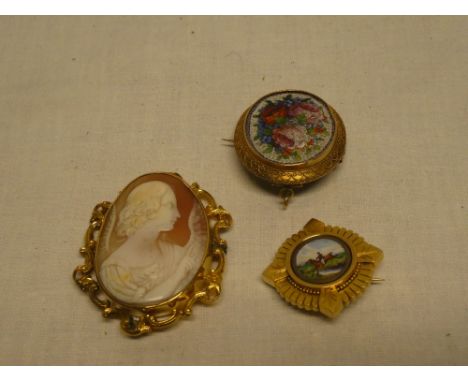 A good quality 19th century oval brooch with inset female cherub cameo portrait; pinchbeck circular brooch with inset enamell