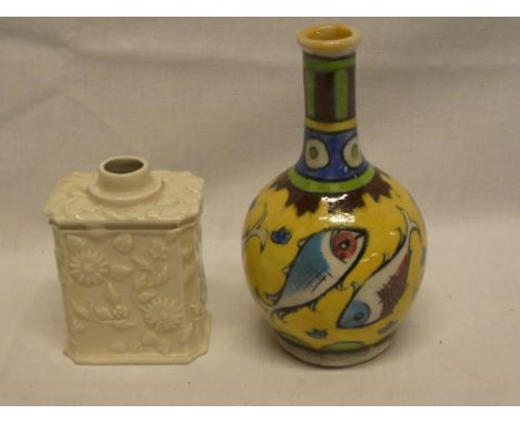 A 19th Century cream glazed rectangular tea caddy with raised floral decoration and an Eastern-style tapered spill vase with 
