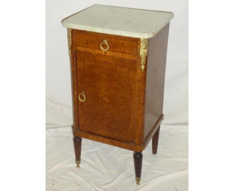 A late 19th Century French inlaid walnut bedside cabinet with a single drawer in the frieze and cupboard enclosed by a single