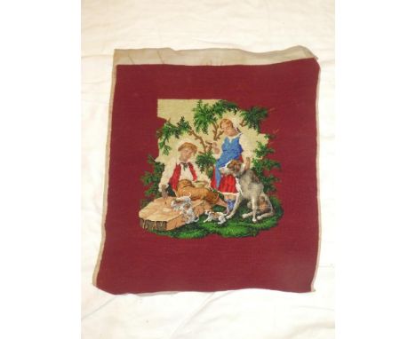 A 19th Century needlework and beadwork embroidered panel depicting two children with dogs in a clearing, 22" x 20"