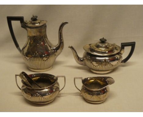 A Victorian silver four-piece tea and coffee set by Mappin &amp; Webb comprising oval tapered coffee pot with gadrooned decor