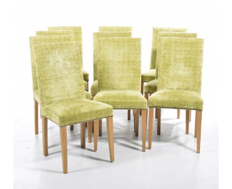 A set of ten contemporary highback dining chairsCovered in an embossed lime green fabric and raised on light oak tapering leg
