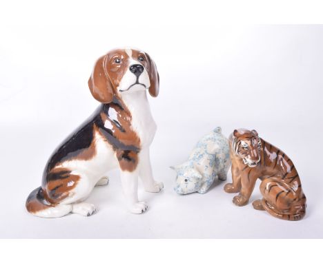 A large Beswick model of a BeaglePainted in brown, white and black, height approximately 33cms, a Royal Doulton figure of a s