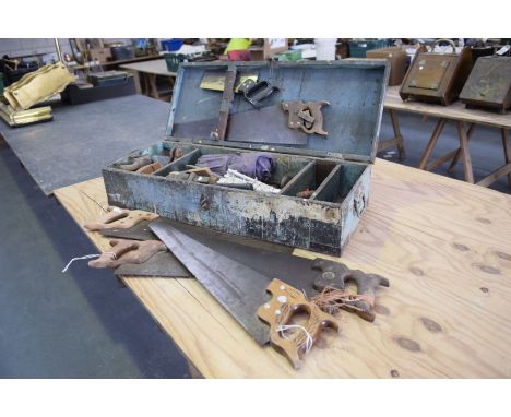 An early 20th Century pine tool chest and a collection of tools
The rectangular hinged cover enclosing a compartmentalized in