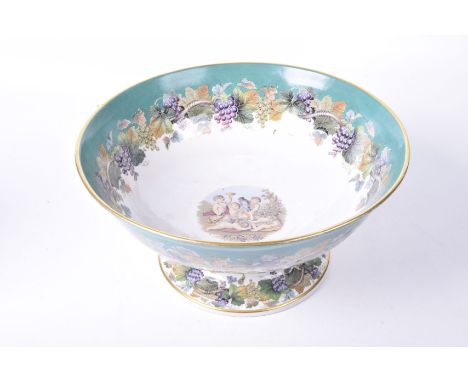 A large Prattware bowl, mid to late 19th CenturyThe bowl with decoration of grapes, the center decoration of nymphs pouring w