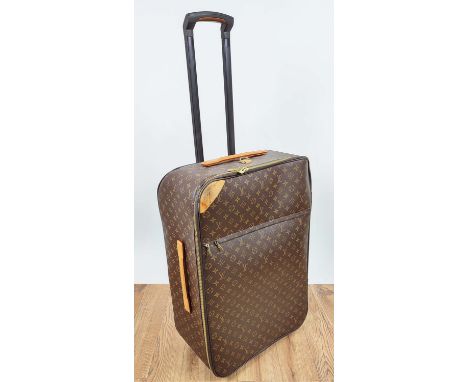LOUIS VUITTON PEGASE TROLLEY, monogram coated canvas with leather side and top handles, top ring for tag, front zippered pock