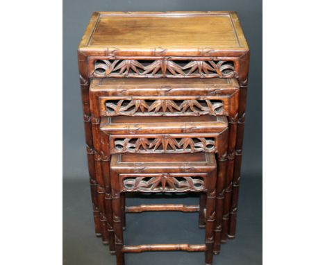Chinese Nest Of Four Tables, Hongmu Quartetto Tabes, Early 20th Century, Each with inset panel top and pierced foliate frieze