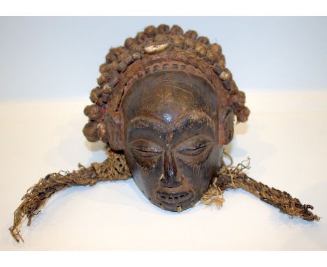 19thC African Tribal Art, Mask Of Small Proportions, With Elaborate Braided Hair Indset With Sea Shells 